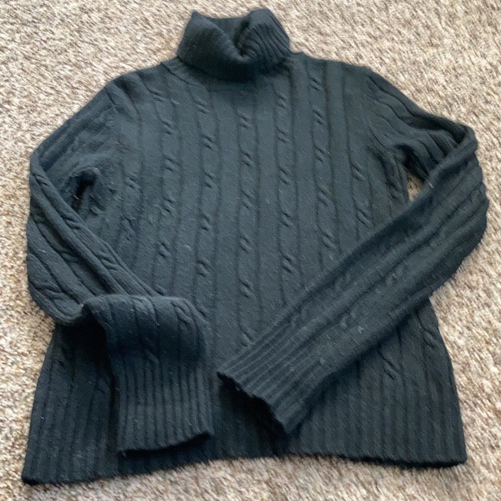 Black cable knit turtle neck sweater